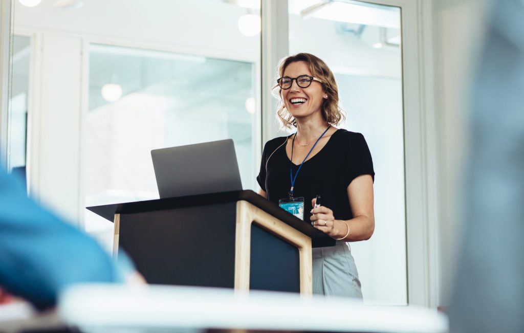 A business woman giving a presentation in an office