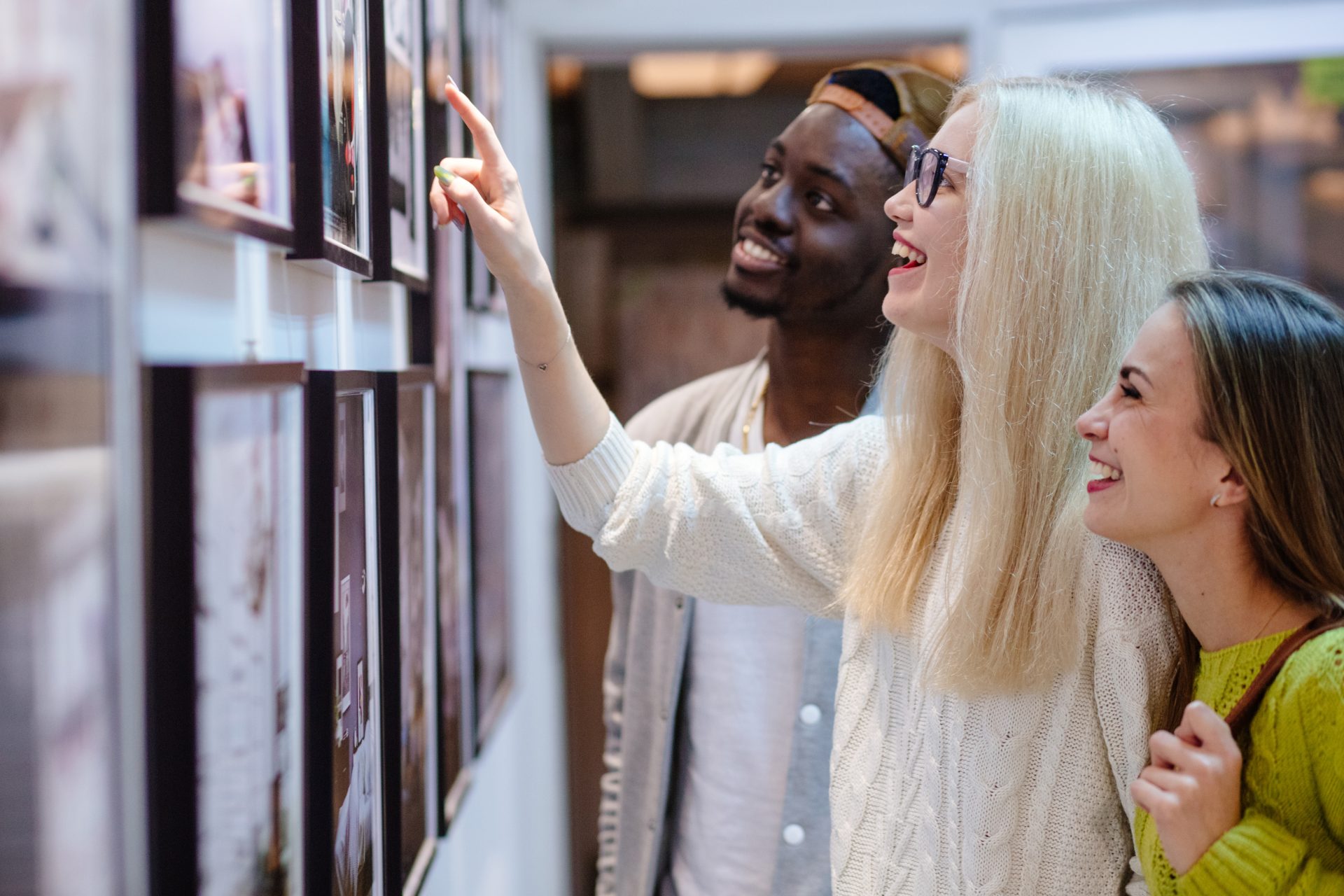 A young couple viewing art in an art gallery